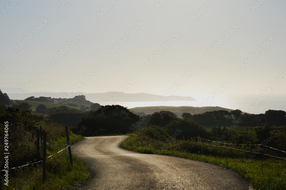 Evening by the sea in a road throught the meadows of Cantabria