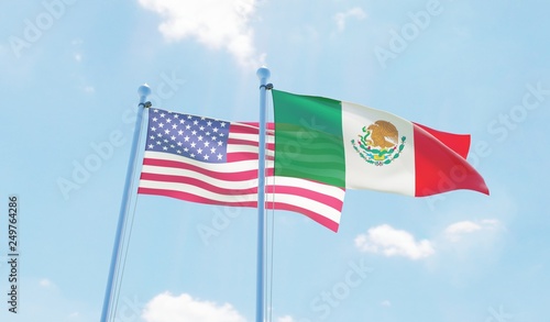 Mexico and USA, two flags waving against blue sky. 3d image