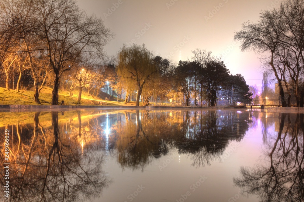 Night view of the park and the lake. Panorama of the park in the city of Odessa, Ukraine