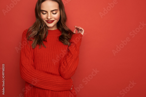 Fényképezés Half length of young charming lady situating in studio