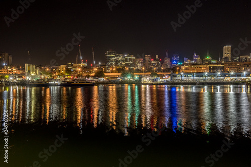 sydney city light reflecting on the water