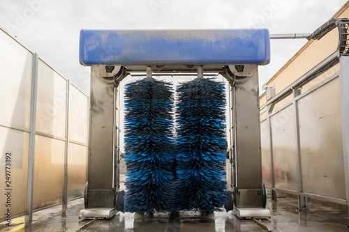 Car Washing Machine With Brushed Spinning on Blurred Background