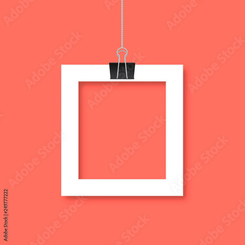 Paper photo frame hanging by binder clips on trendy living coral background. Retro vintage style mockup. Vector illustration. Easy to edit template with copy space for your picture or text.