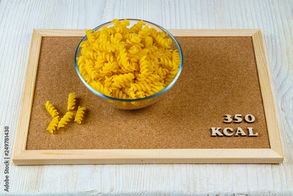 calorie products dry pasta fusilli pasta 350 kcal 100 grams diet Stock Photo Adobe Stock