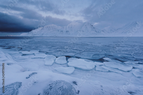  norway landscape ice nature of the glacier mountains of Spitsbergen Longyearbyen Svalbard arctic ocean winter polar day blue sky