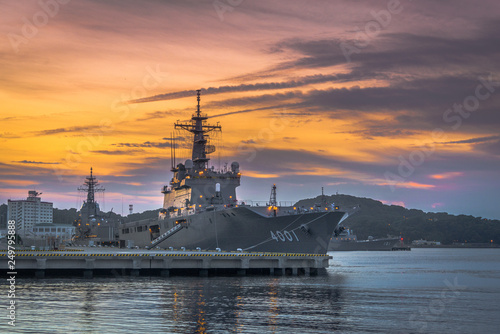 Naval warships at sunset