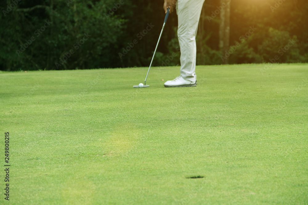 Fototapeta premium Golfers are putting golf in the evening golf course golf backglound in Thailand