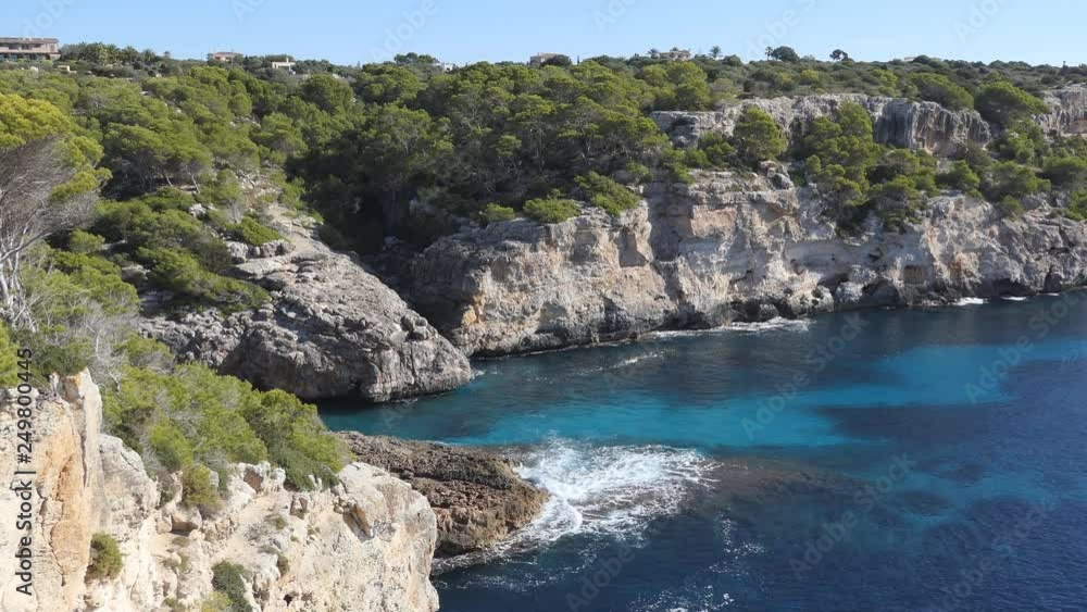 Rocks by the sea cove with turquoise water. Rocks by the sea cove with turquoise water.