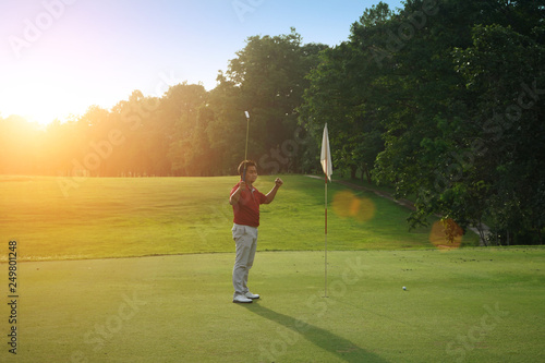 Golfers are putting golf in the evening golf course golf backglound in Thailand