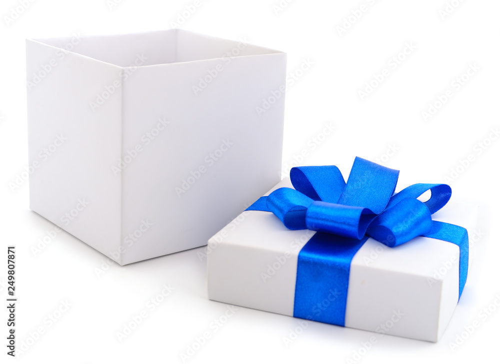 White gift box with blue ribbon. White gift box with blue ribbon.