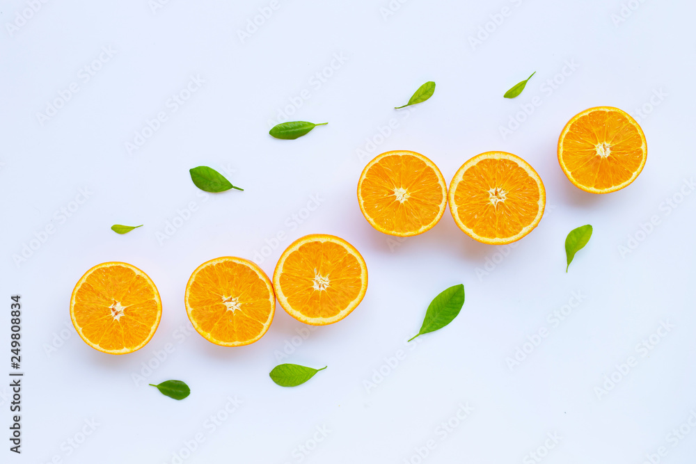 High vitamin C. Fresh orange citrus fruit with leaves isolated on white. High vitamin C. Fresh orange citrus fruit with leaves isolated on white.