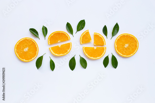 High vitamin C. Fresh orange citrus fruit with leaves isolated on white.