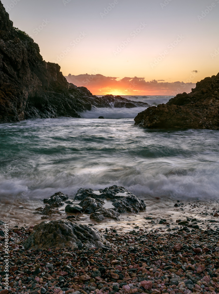 sunrise at a cove with water movement 