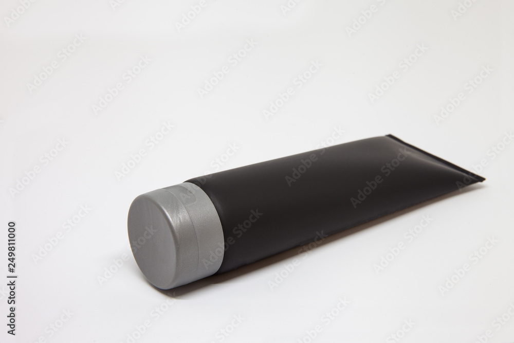 black tube with gray cap black tube with gray cap
