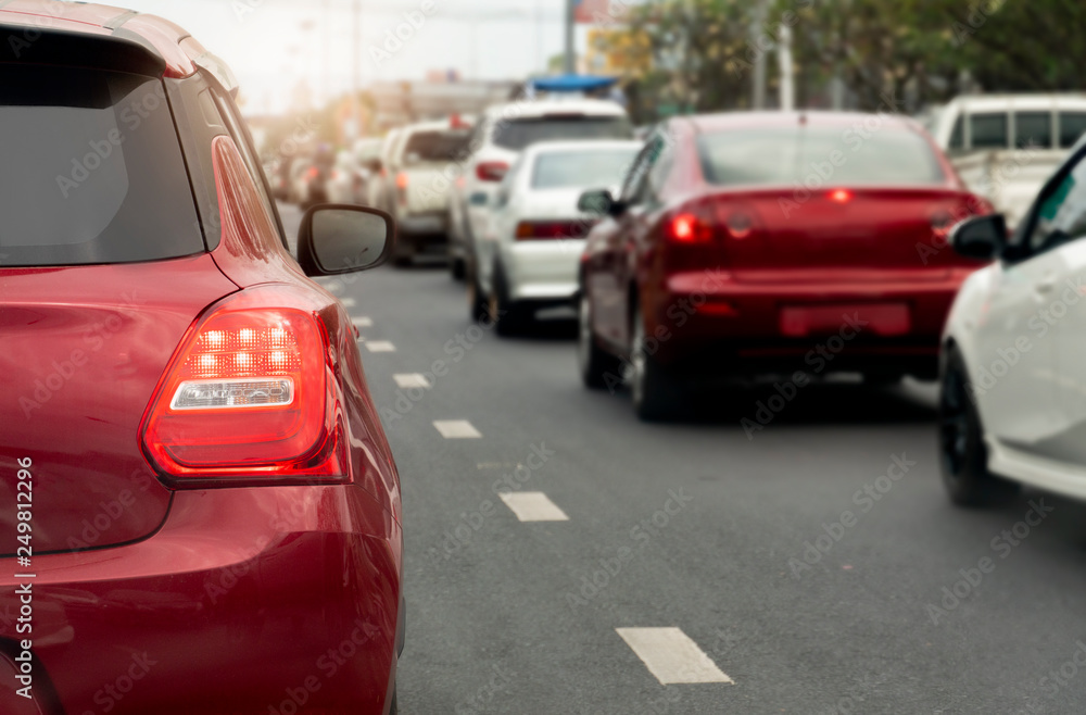 Cars on the road heading towards the goal of the trip.Traffic jams in rush hour. Cars on the road heading towards the goal of the trip.Traffic jams in rush hour.