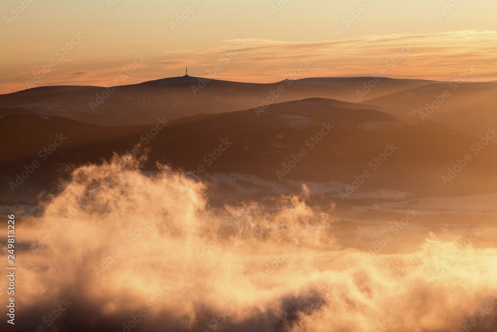 Obraz premium Fantastic winter landscape in snowy mountains. Inversion weather. Christmas holiday concept. Praded, Jeseniky mountains, Czech republic, Europe. Beautiful panorama