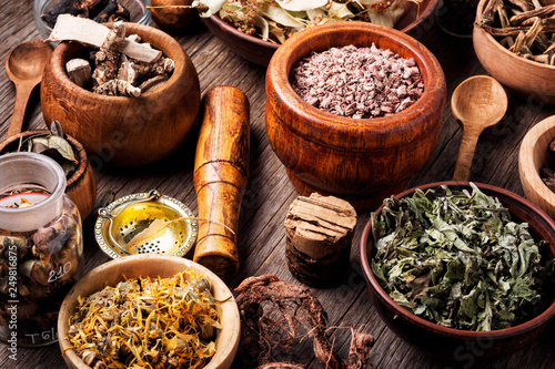 Konstfotografi Healing herbs on wooden table