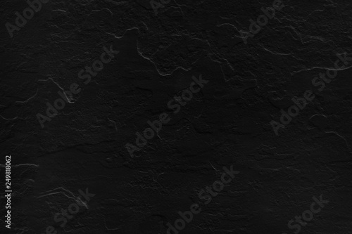 background of black stone texture.