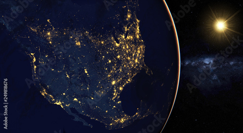 Fototapeta Naklejka Na Ścianę i Meble -  the rising sun over the American continent, the view from the satellite. Elements of this image furnished by NASA.