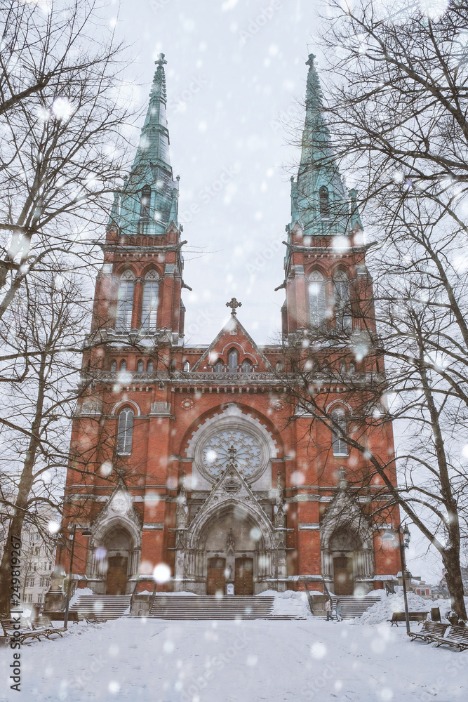 Church of St. John Lutheran Neo-Gothic style temple in the Finnish capital Helsinki in winter in snowfall Church of St. John Lutheran Neo-Gothic style temple in the Finnish capital Helsinki in winter in snowfall