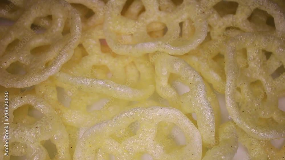 Salty snack snacks rotating seamless looping food texture pattern close up footage Salty snack snacks rotating seamless looping food texture pattern close up footage