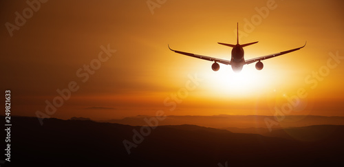 modern aircraft against a sunset © frank peters