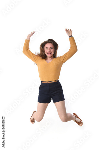 young smiling woman jumping