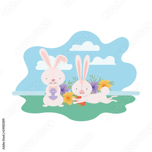 easter bunnies with landscape isolated icon