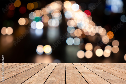 Wooden table on front blurred colorful bokeh background  abstract  used for presentation and template  banner website