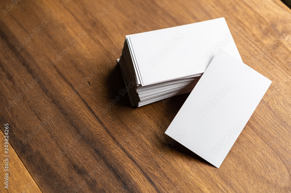 Fototapeta premium Business cards blank mockup on wooden background
