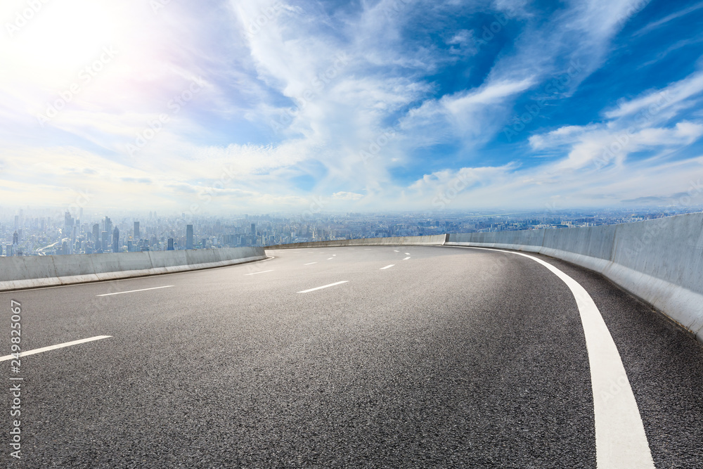 Fototapeta premium Empty asphalt road and modern city skyline with buildings in Shanghai,China
