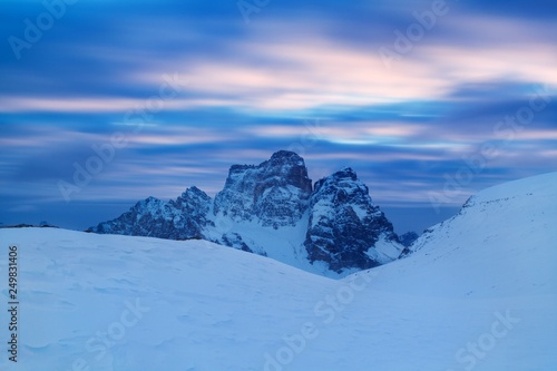 Mountain landscape panoramic view with cloud sky Gorgeous winter day in Dolomites  Italy. Colorful outdoor scene  Happy New Year celebration concept. Panorama of white winter mountains with snow