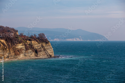 Rocky cliff  seashore and sea landscape. Beautiful travel outdoor background