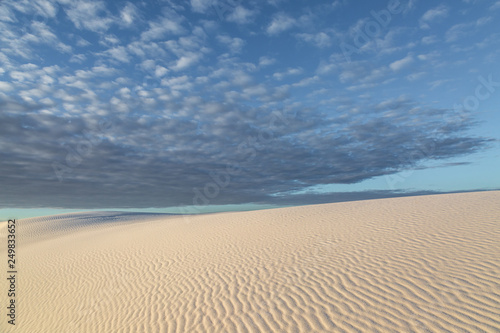 Fototapeta Naklejka Na Ścianę i Meble -  Clouds over the sand dunes at sunrise, at White Sands National Monument, New Mexico