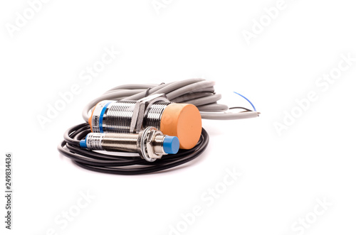 Inductive proximity sensor or proximity switch installed on the machine.