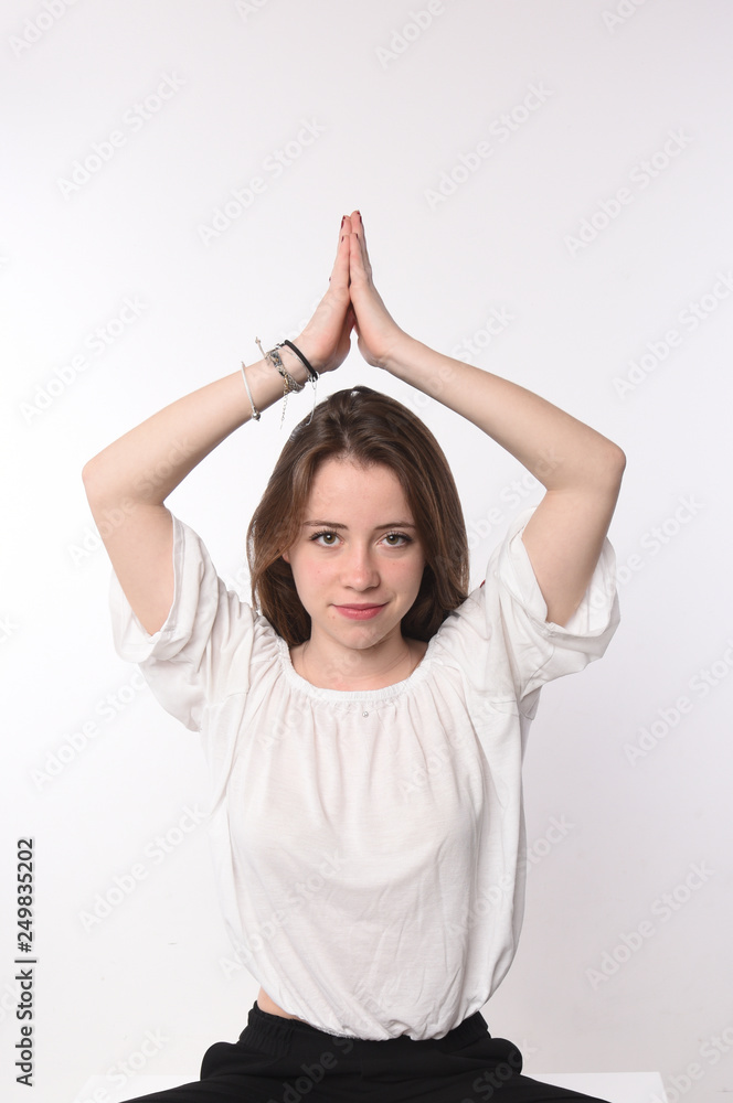 young brunette woman doing yoga