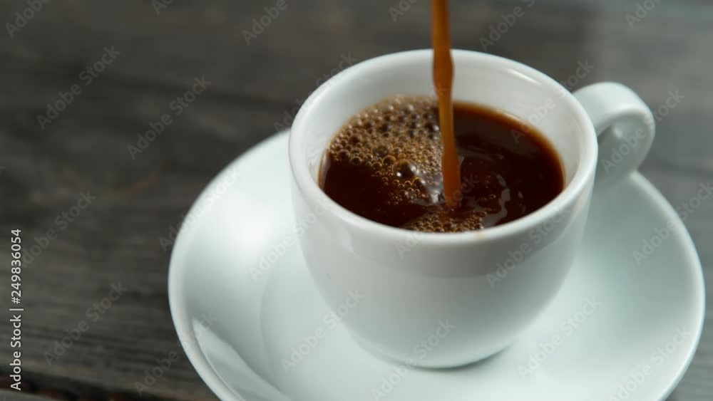Pouring coffee in super slowmotion. Shooted with high speed cinema camera at 4K, 1000fps. Pouring coffee in super slowmotion. Shooted with high speed cinema camera at 4K, 1000fps.