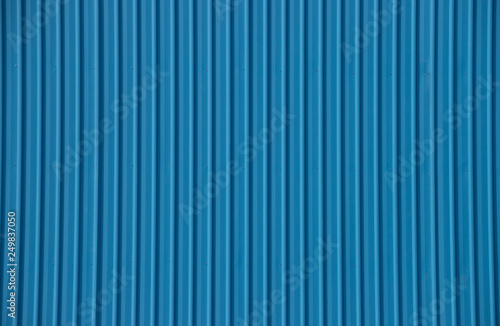 blue metal sheet background and texture. corrugated wall.