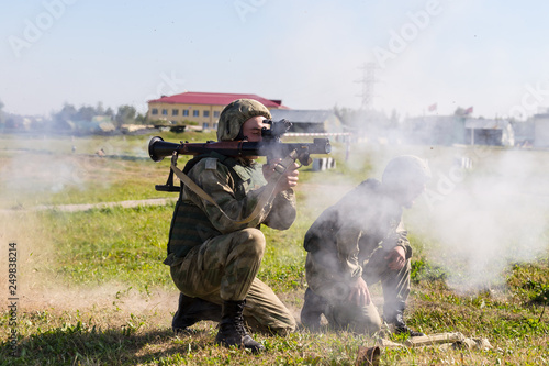 A soldier shoots an RPG-7