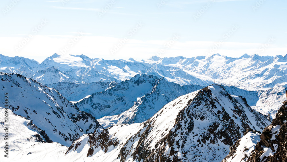 Alps in winter day, Austria, Stubai, Stubaier Gletscher ski resort. Beautiful mountain view.