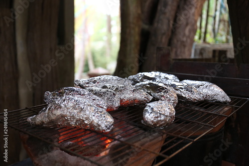 Potatoes on the grill in foil
