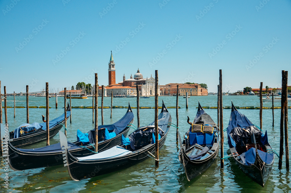 Gondolas in Venice. Gondolas on Grand canal. Gondola service tourist people travel around Venice in Italy
