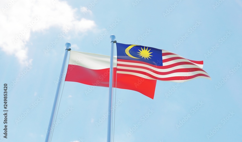 Malaysia and Poland, two flags waving against blue sky. 3d image Malaysia and Poland, two flags waving against blue sky. 3d image