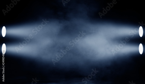 Misty projector . Blue spotlight with smoke fog effect. Isolated on black background.