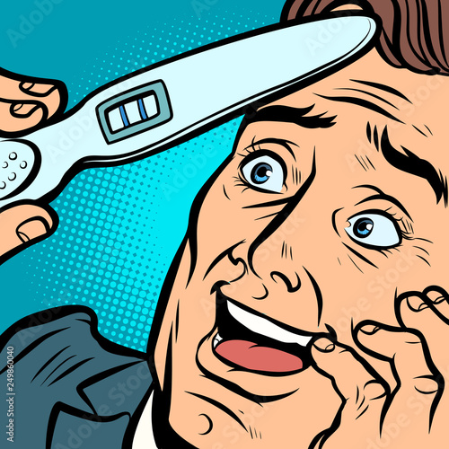 pregnancy test. joyful man husband father