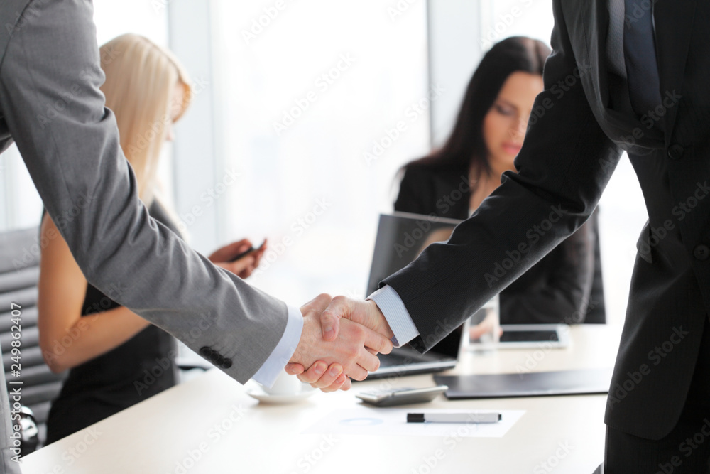 Business people shaking hands Business people shaking hands