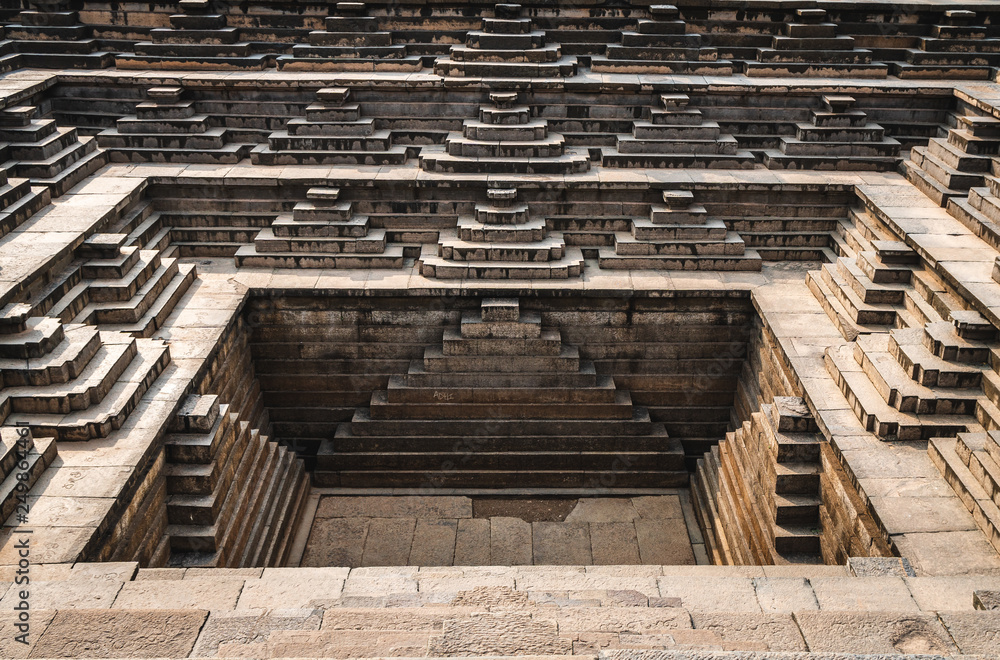 Stepped Tank of the Vijayanagara Empire stone rock in Hampi Karnataka Stepped Tank of the Vijayanagara Empire stone rock in Hampi Karnataka