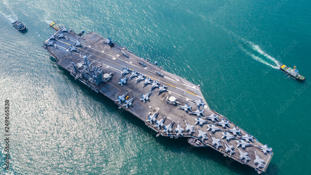 Foto Stock American navy nuclear aircraft carrier, USA military navy ship  carrier full loading fighter jet aircraft, Aerial view. | Adobe Stock