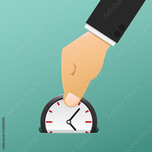 Hand holding a clock ticking into the slot,Time saving concept.