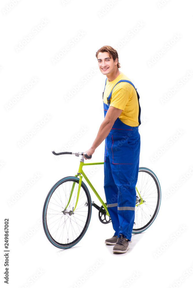 Obraz premium Man repairing his bike isolated on white background